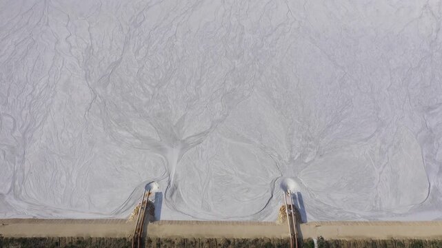 Aerial drone view of tailings pond near a cement factory near to Devnya, Varna, Bulgaria. Industrial scene of environmental impact