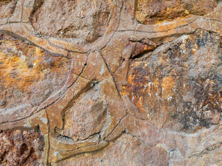 Closeup of old stone wall texture background
