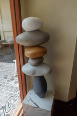 Six balancing stones decor in cozy home,zen concept,balancing zen pebble stones outdoor,mental calmness, tranquil scene soul equanimity concept.