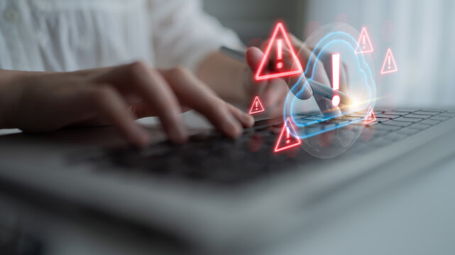 Red alert triangles over a blue cloud icon, symbolizing cloud security threats, system warnings, and data protection risks in digital environments Parse