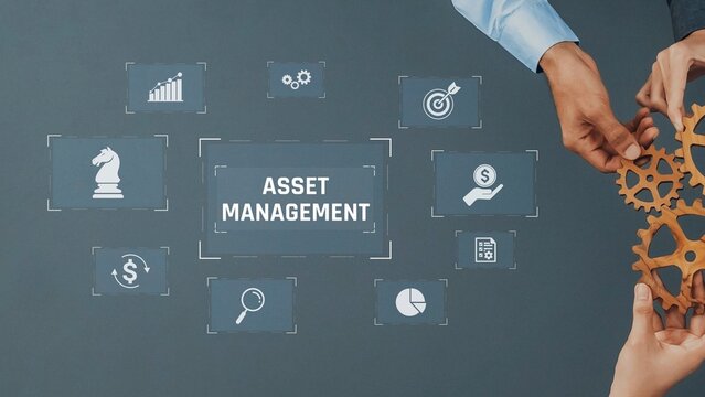 Two hands work together to turn gears representing asset management with various business icons displayed on a gray background for strategy development. Raster