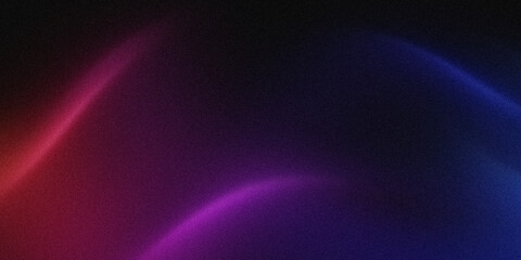 Abstract swirling light trails in vibrant red and blue hues on a dark background