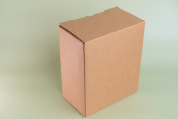 Mock-up of recycled eco friendly cardboard box, product and paracel packaging isolated on green background. Horizontal orientation.