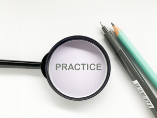 'PRACTICE' on a pale lilac background, with a pen and pencil nearby, suggesting dedication, repetition, and skill development.