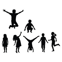 Silhouettes of joyful children playing and enjoying outdoor activities together