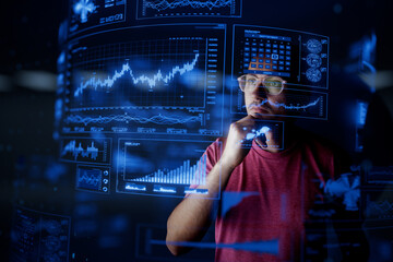 Man look at the dashboard with graphs and charts. Concept of data management system, business intelligence, data statistics, marketing analysis, key performance indicators (KPI) and analytics.