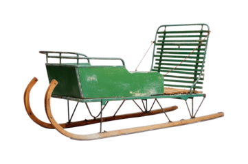PNG Vintage green sled with metal runners.