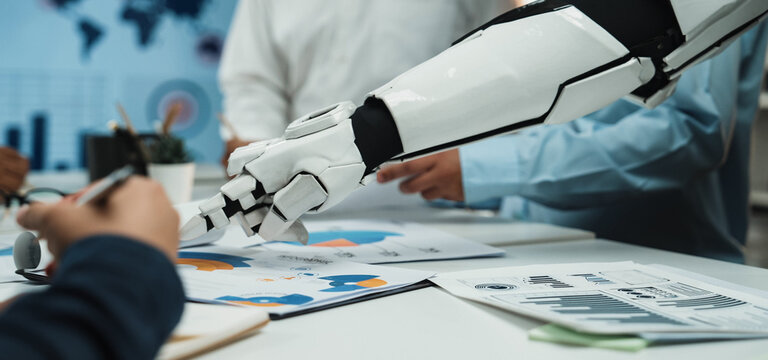 Professionals discuss marketing innovations informed by AI analytics, emphasizing research-driven collaboration in a contemporary workspace. Noogenesis AI