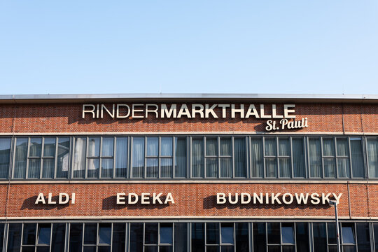 HAMBURG, GERMANY - 11. June 2025: Rindermarkthalle building exterior in the St. Pauli district. Close-up of the facade with names of the retailers. Weekly market near the Heiligengeistfeld.