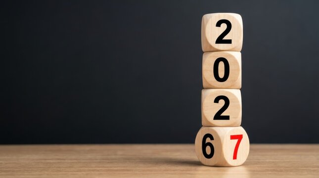 2027 Wooden Block Stack &ndash; Year Change Countdown and New Beginnings Concept with copy space