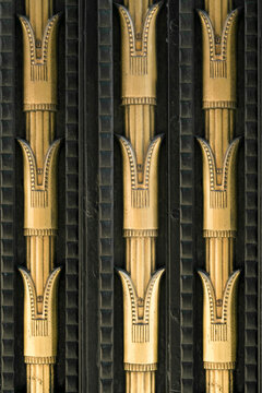 New York City, NY. close up detail of 1920's art deco metal work in gold and black. 