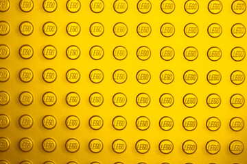 Naklejka premium Lviv, Ukraine - November 16, 2025: LEGO Brick Surface Texture Background