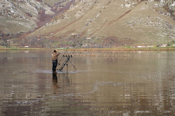 fisherman in the lake