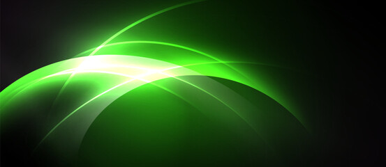 Abstract green energy flow. Bright light radiates from curves, creating dynamic visual impact. Dark background enhances luminosity.