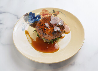Hamburger steak with teriyaki sauce, a culinary masterpiece with rich gravy. Perfect for food blogs, menus, and gourmet restaurant promotions.