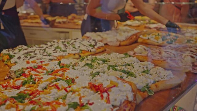 Traditional Italian Pizza al Taglio Display in Bergamo, Italy.Filmed on 21 September 2025.