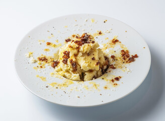 Italian comfort food with creamy polenta, savory pancetta, and a sprinkle of parmesan. A perfect dish for cozy evenings.