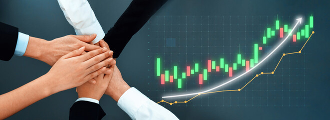 A visual representation of teamwork and collaboration in a business environment, showcasing hands joined together near a chart indicating positive financial growth and market success. Axiom