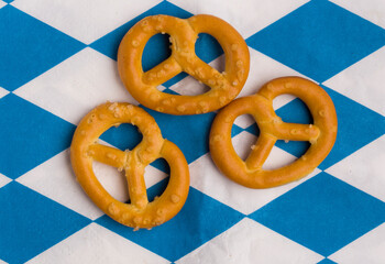 German pretzels on a red and blue checkered background