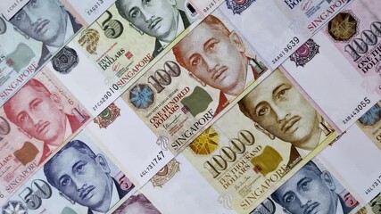 Money, currency of Singapore, dollar banknotes of various denominations. Singapore money as a financial background for your design