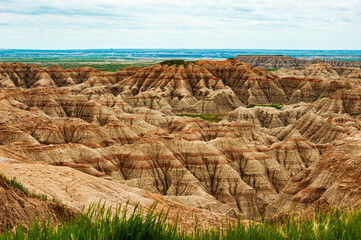 Badlands National Park in South Dakota. The rugged beauty of the Badlands draws visitors from...