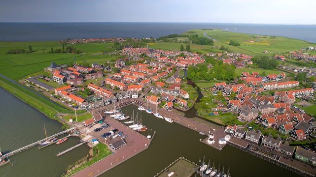 Aerial view of scenic Marken island landscape with colourful homes and Marina,