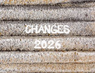Changes 2026 symbol. Concept words Changes 2026 on beautiful grey mountain wall. Beautiful grey mountain wall background. Business and changes 2026 concept. Copy space.