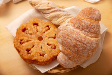 Buñuelos de viento. Traditional food at Christmas and winter holidays in Mexico, these are fried dough flour sprinkled with sugar or covered in a syrup made with piloncillo, cinnamon, and guava.