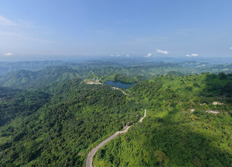 Drone’s Eye View - Serpentine Hill Paths and Vibrant Green Hills of Bandarban Under a Dramatic Sky