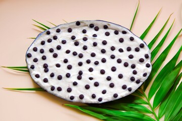 Traditional exotic cupuaçu mousse and cupuaçu cream, with chocolate chips, a sweet dessert from the Brazilian Amazon region.