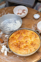 Rural Moldovan Grandma Preparing Traditional Homemade Cheese Pastry. Authentic Village Cooking. Healthy Old Customs in Moldova.
