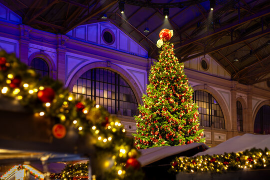Festive Christmas market in Zurich railway station hall, Switzerland