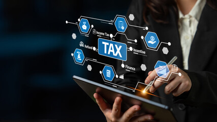 Business professional engages with a digital tablet to analyze tax-related information, showcasing a modern interface with icons that symbolize financial strategies and incentives. Tessel
