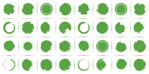 A collection of thirty five green circle brush stroke design elements on a white background pattern