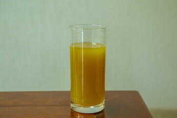 Fresh Sugarcane Juice with Lime on Sugarcane Stalks