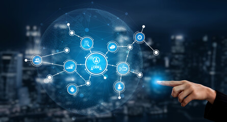 This image depicts a digital network with various data points highlighted, symbolizing connectivity and interaction in a modern urban setting at night. Tessel