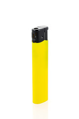 Gas lighter yellow color isolated on white background. Close-up