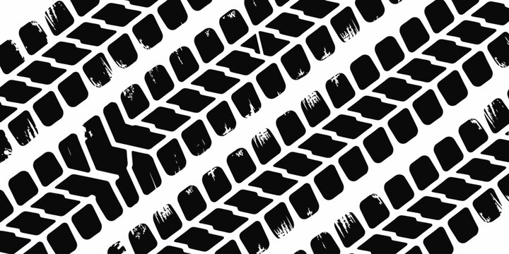 A detailed close up of black tire tracks on a white background showing the tread pattern clearly visible