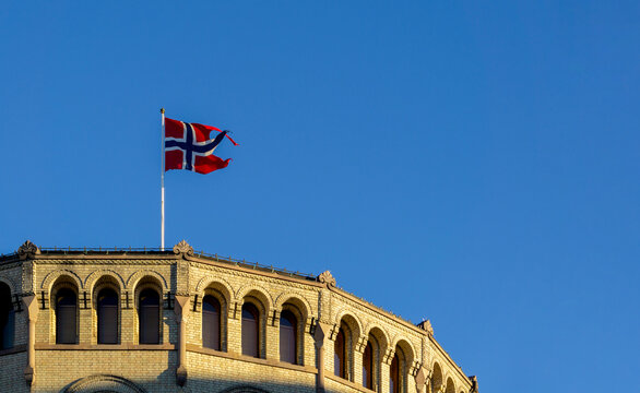 Norwegian Flag Flying Above Storting Parliament Building in Oslo - National Symbol