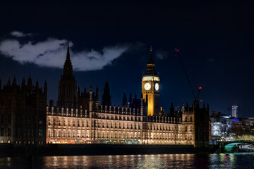 Big Ben and the Houses of Parliament illuminated at night.