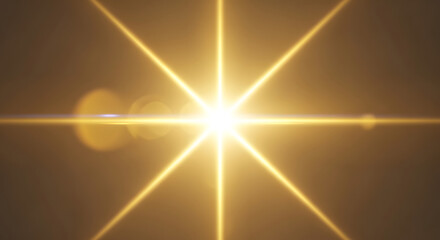 Bright golden starburst light effect with lens flare