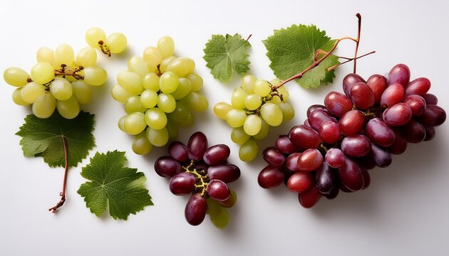 An Overhead Flat Lay Arrangement Of Fresh Green And Red Grape Bunches Scattered On A Clean Bright White Background Ready For Eating