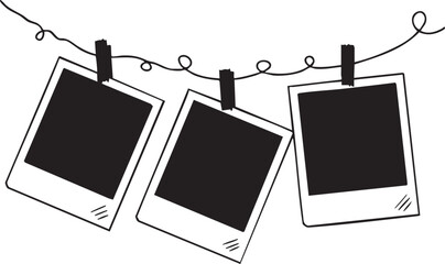 Three black instant photo frames hanging on a string with clothespins silhouette isolated on transparent background
