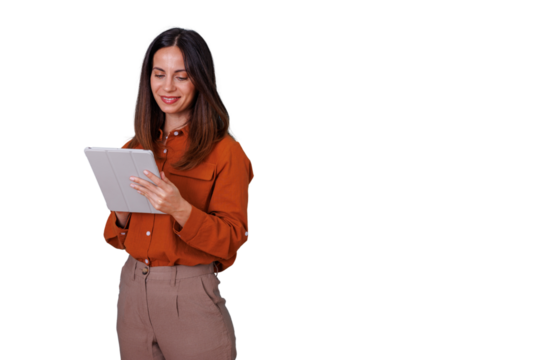 Woman smiling and holding a modern digital tablet, browsing social media or working, on a transparent background