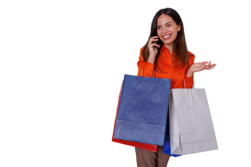 Woman shopping, smiling and talking on smartphone, holding retail bags, enjoying consumerism on a transparent background