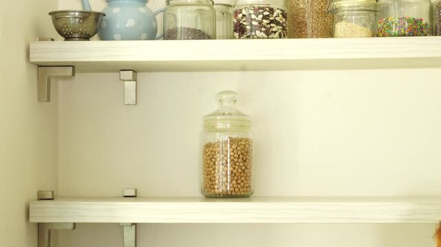 Process of cleaning glass jars at the kitchen