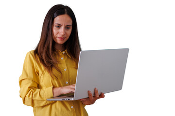Naklejka premium Woman working on laptop, typing and connecting online, remote business professional using technology