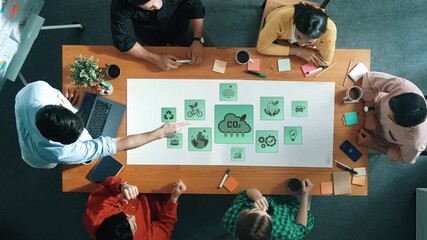 A diverse team engages in a creative brainstorming session around a table covered with colorful notes and ideas, fostering collaboration and innovation in a modern office. Raster - Powered by Adobe