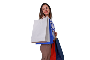 Woman enjoying shopping, holding white, blue, and red bags, consumerism and retail activity, looking away and smiling on transparent background