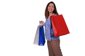 Young woman smiling, carrying colorful shopping bags, enjoying consumerism and retail activity, transparent background